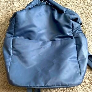 Light blue satin backpack w/ 4 external pockets
